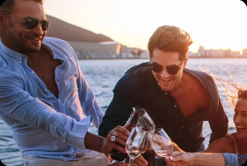 Champagne service aboard Liberté for a catered Auckland yacht charter