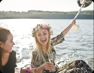 A group celebrating a hens party on a yacht