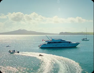 A luxury yacht anchored in a scenic New Zealand bay